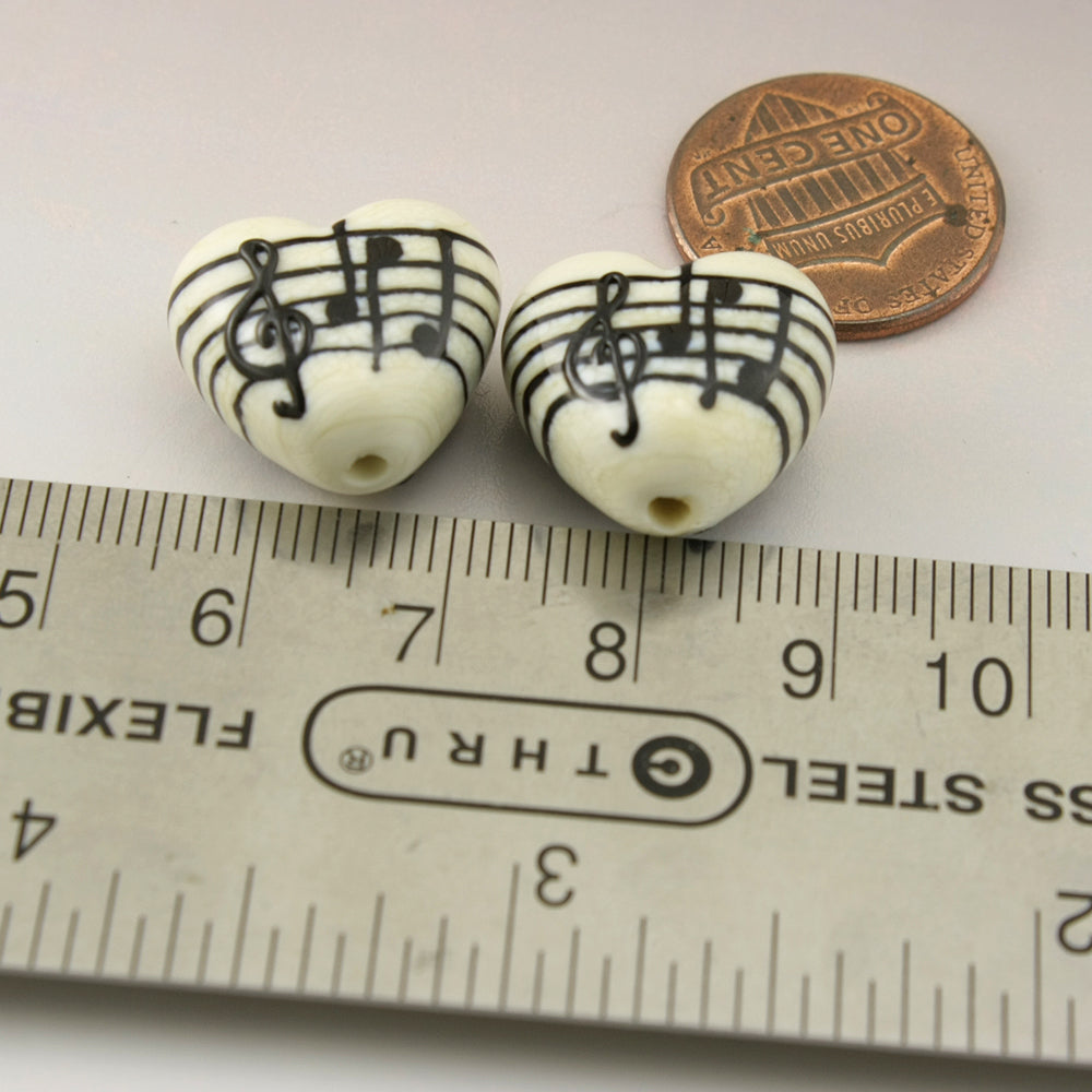 Ivory Heart Pair with Black Music Notes and Manuscript
