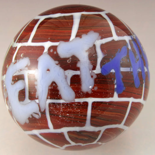 "Eat the Rich" Brick Wall Graffiti Marble